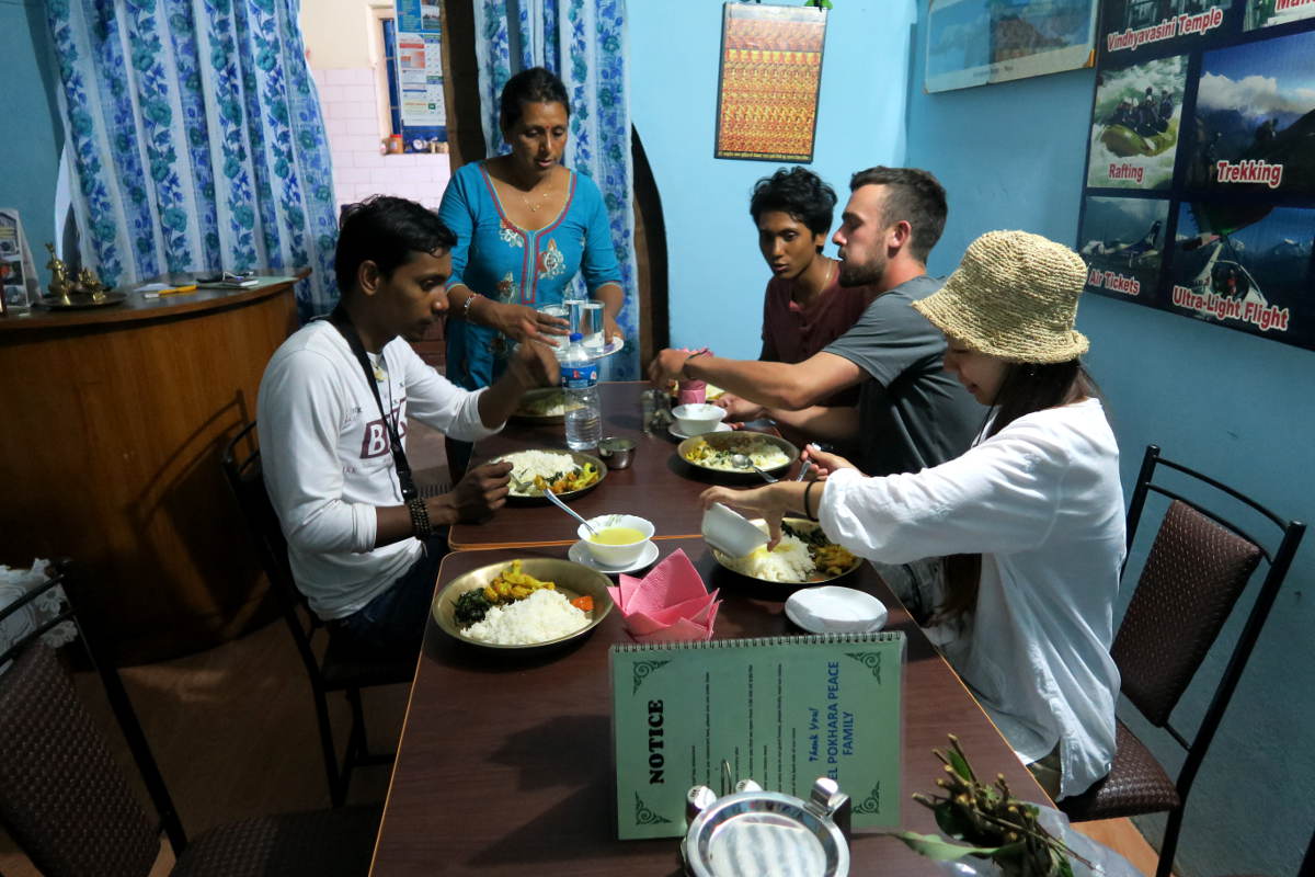 Eating Dal Baht in Hotel Ice View in Pokhara - Happymind Travels