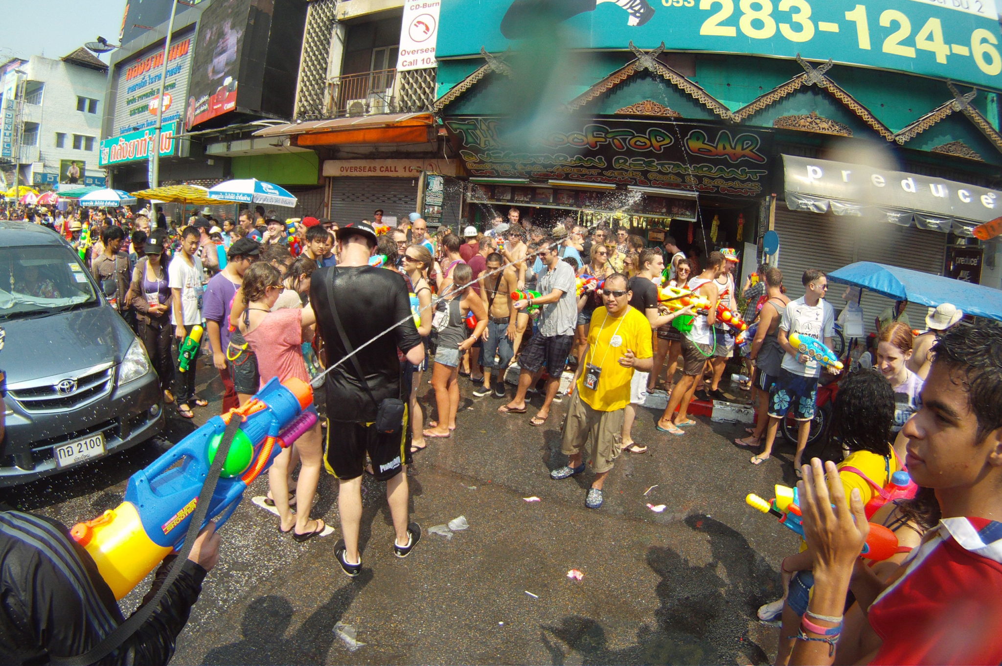Songkran water fight in Chiang Mai - Happymind Travels