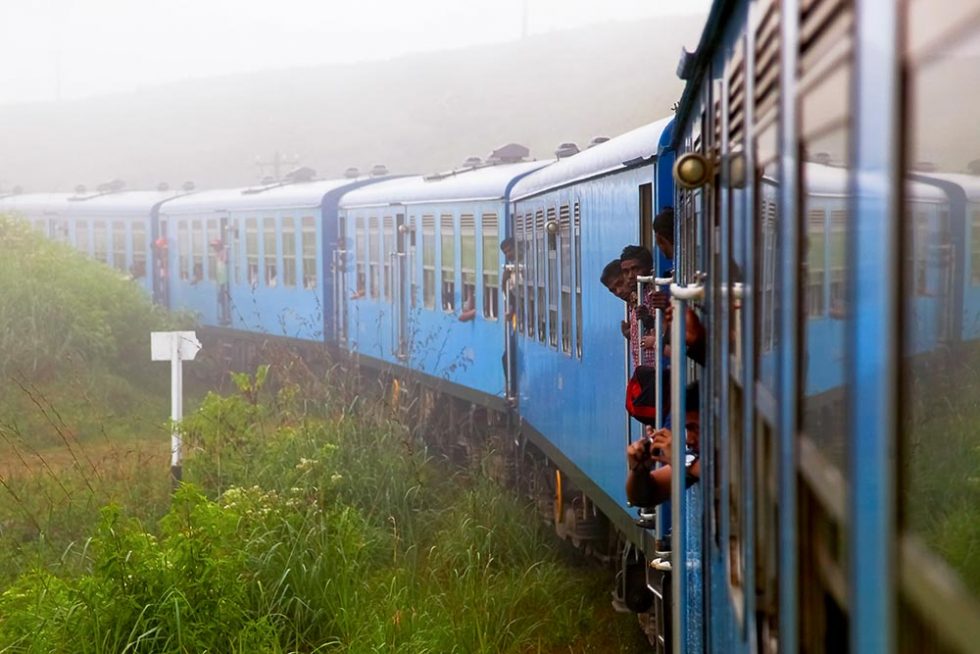 Train passing near the town of Nuwara Eliya, Sri Lanka | Happymind Travels