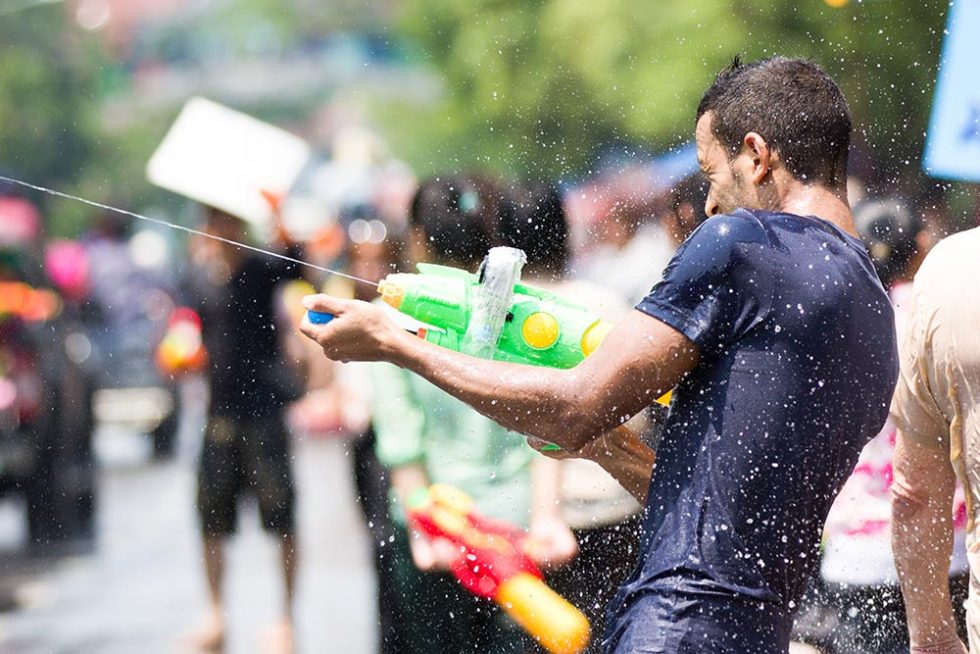 Water fight during Songkran in Thailand | Happymind Travels