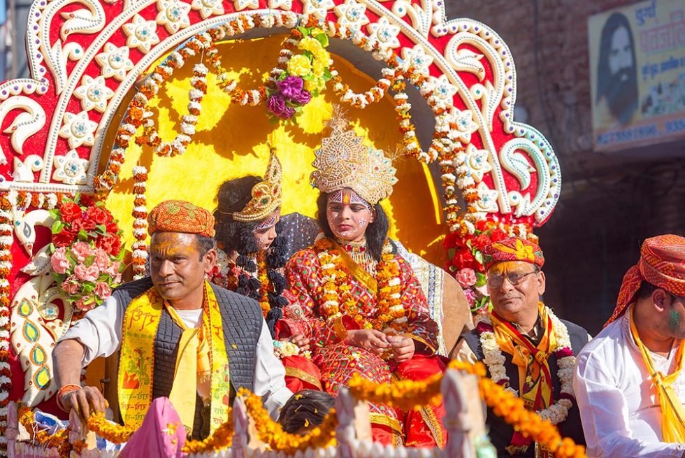 Parade during the Holi Festival in Mathura, India | Happymind Travels