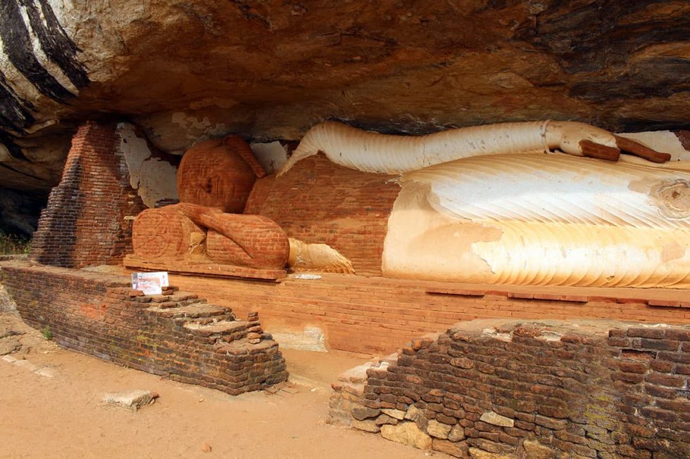 Buddha Statue on the ascent of the Pidurangala stone in Sigiriya, Sri Lanka | Happymind Travels