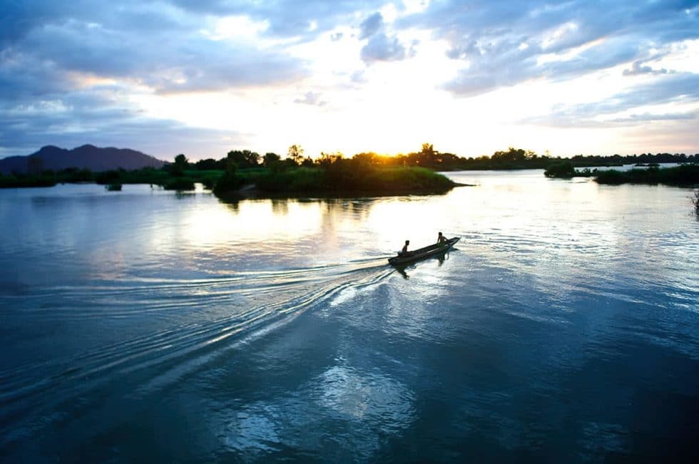 Boat on the Mekong River in the 4000 Islands, Laos | Happymind Travels